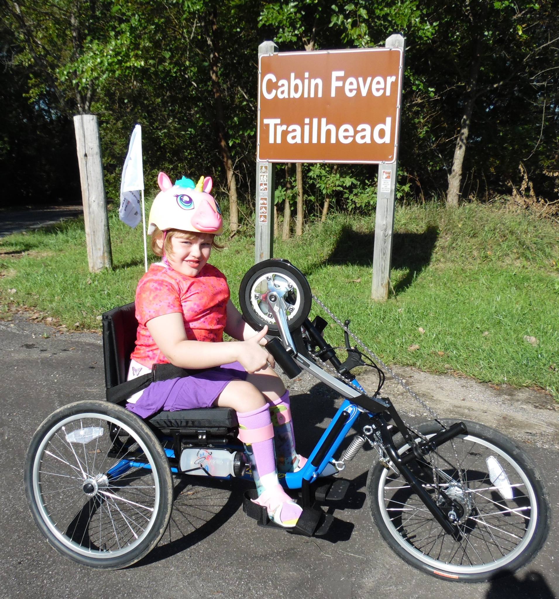 Photo: Pictured: Real Life Expert's daughter, Elizabeth, on her adapted bicycle.